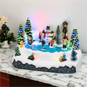 VILLAGGIO DI NATALE INNEVATO LOTTI CON LED MUSICA E MOVIMENTO ROTANTE – 15,5 CM in Natale