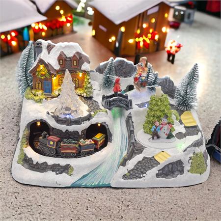 villaggio natalizio innevato con trenino e babbo rotanti ruscello led a fibre ottiche rgb e musica natalizia