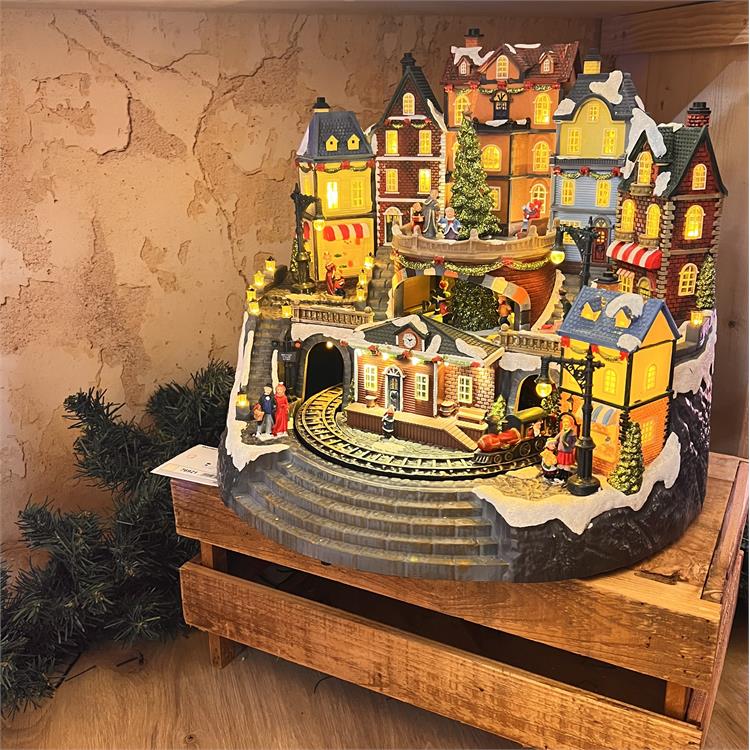 VILLAGGIO DI NATALE IN MOVIMENTO CON STAZIONE, TRENINO E ALBERO ROTANTE - LUCI LED E MUSICHE